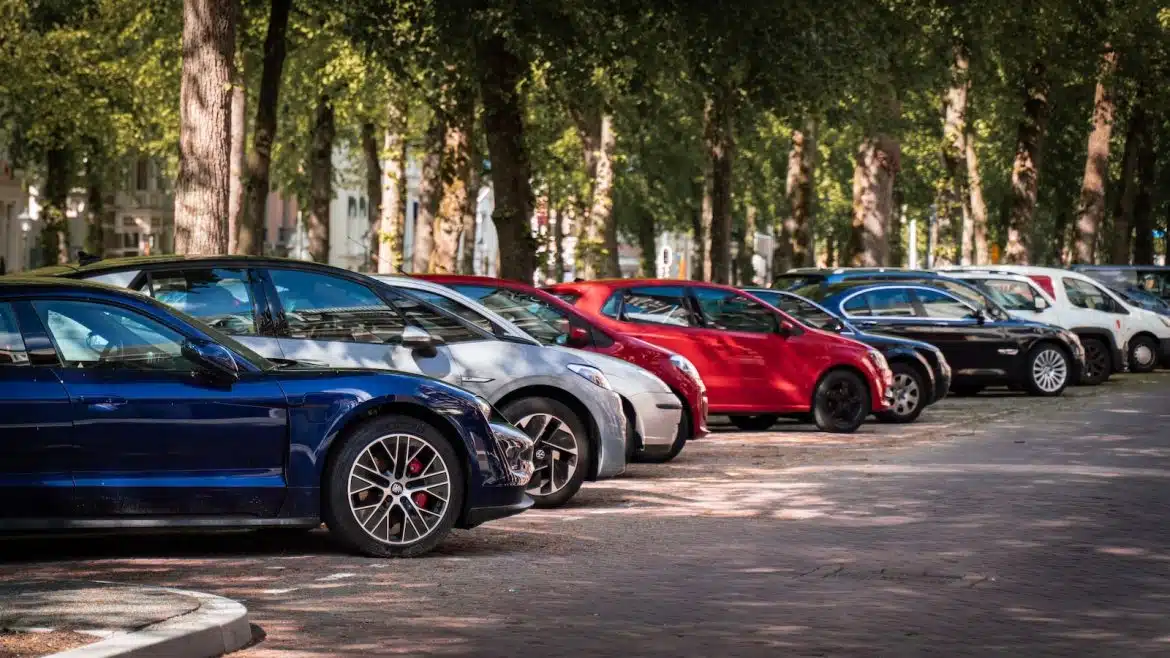 blue and red sports car on road during daytime